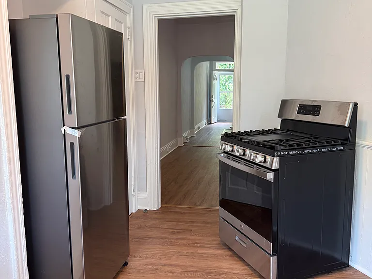 Kitchen looking towards front door and dining room