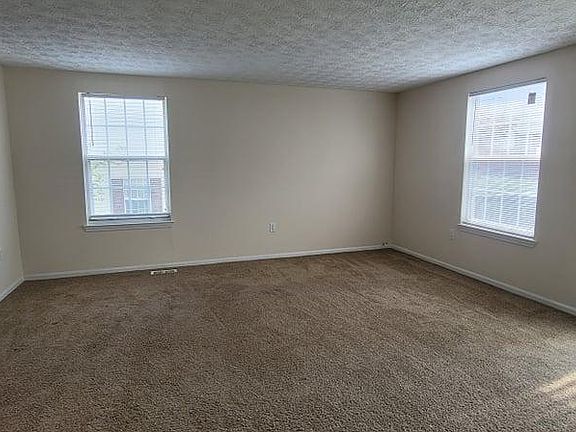 living room with slider to the deck