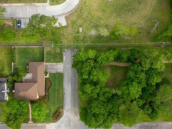 The home is on the left, the park is on the right.... what a great reason to take a nice, easy walk each evening. Quiet neighbors to the rear with an assisted living/over 65 residence.