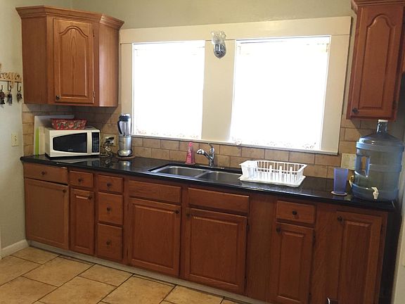Kitchen with granite countertops.