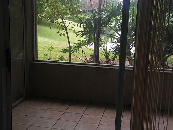 4th image of 1885 Palm Cove Blvd #1ST