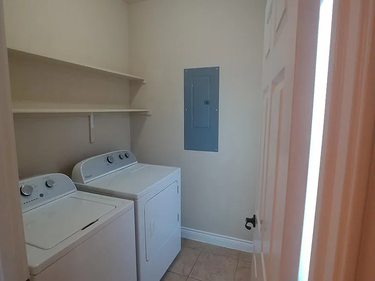 Washer & Dryer included
Laundry room attached to 1/2 bath on first floor