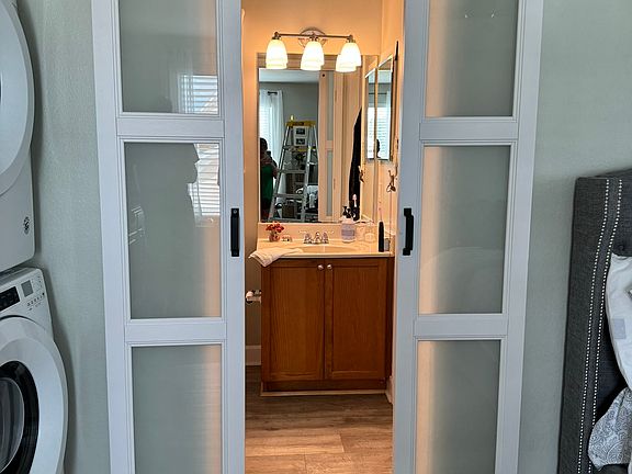 Barn doors entrance to bathroom