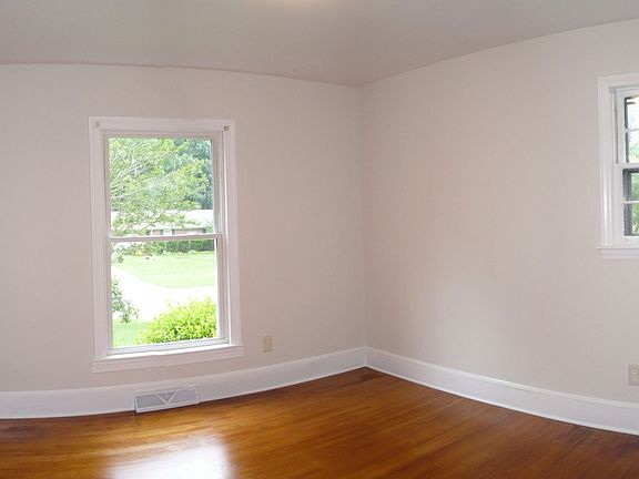 The bedrooms feature refinished hardwood floors