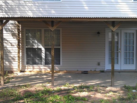 Side with covered porch