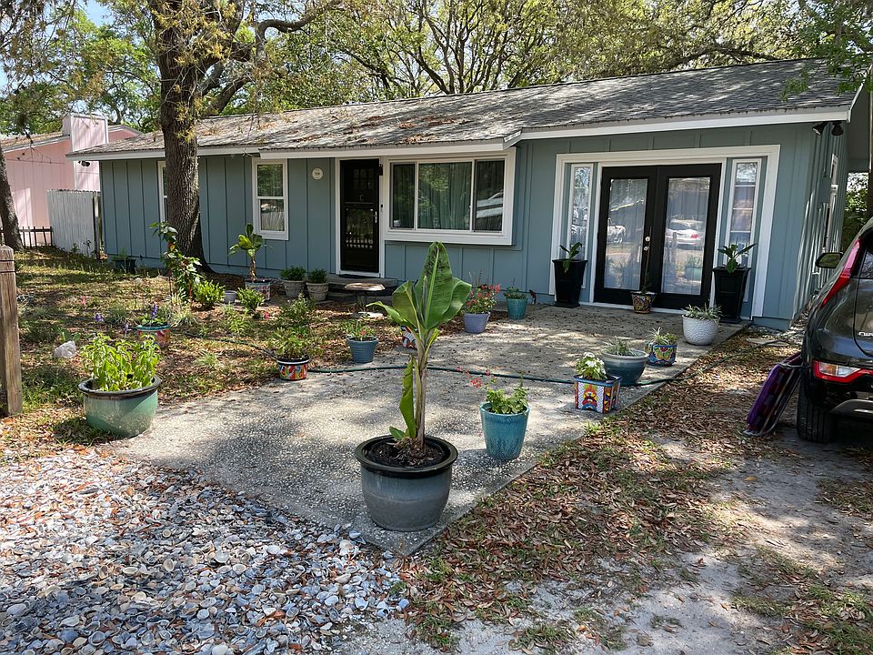 One bedroom home with new roof, siding and windows, off-street parking, garden in process.