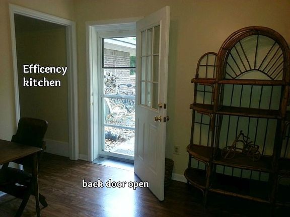 view of living room with open door