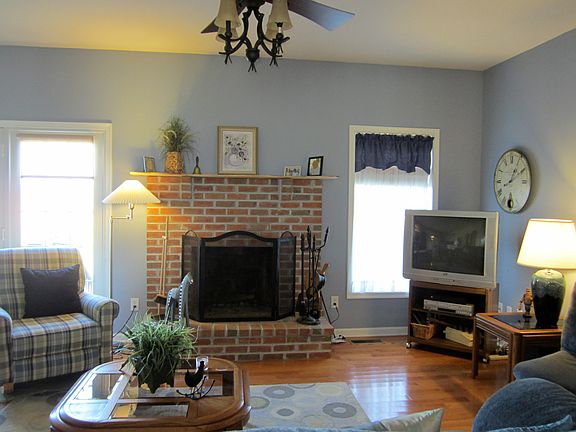 woodburning fireplace in living room