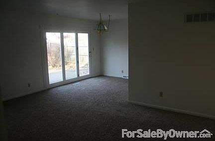 Living
						:
						Living/Dining room looking out into backyard.