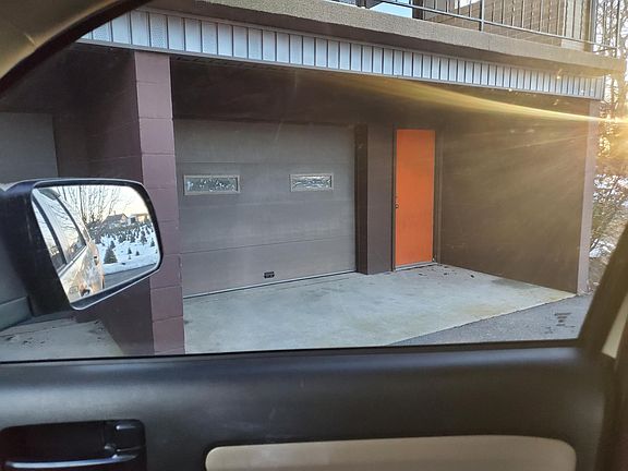 Garage under porch with opener
