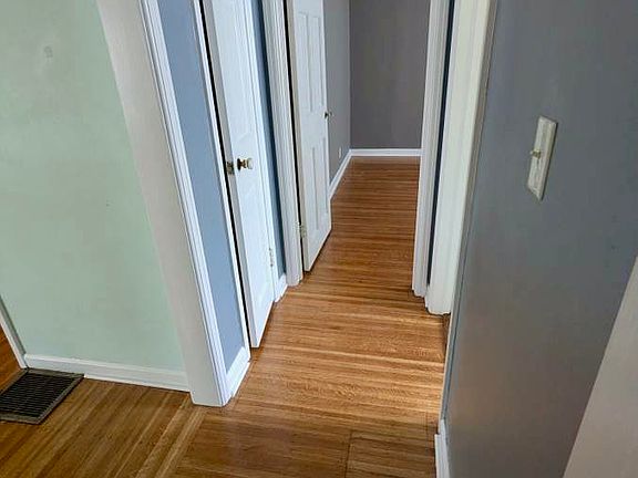 hallway to 2nd, 3rd bedrooms and bathroom