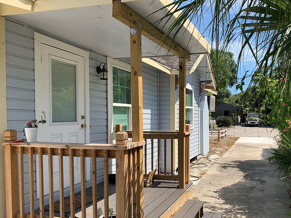 Unit's entry porch and dedicated driveway