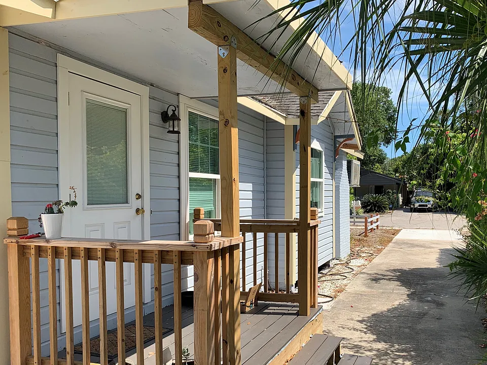 Unit's entry porch and dedicated driveway