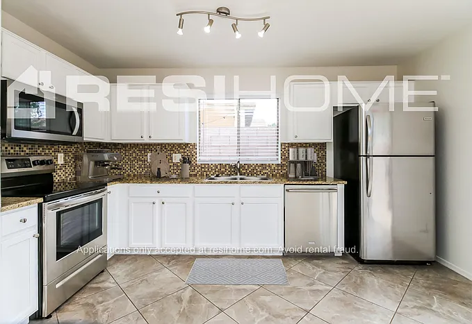 10837 E Carol Ave — Photo 3