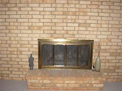 Wood burning fireplace, family room