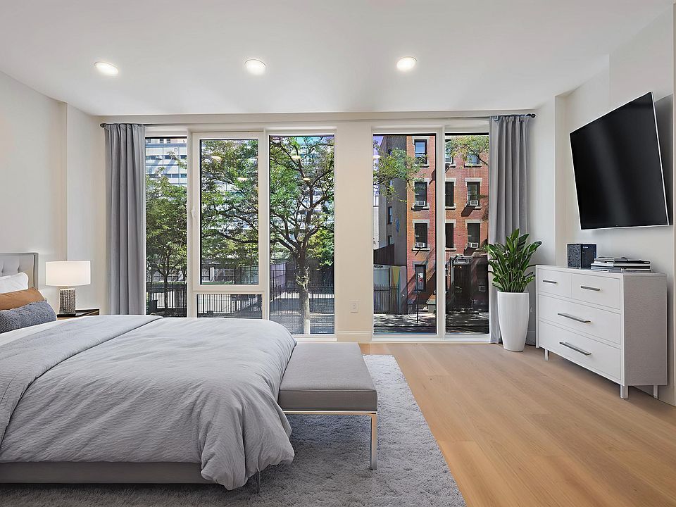 1st image of 410 W 49th St #Townhouse