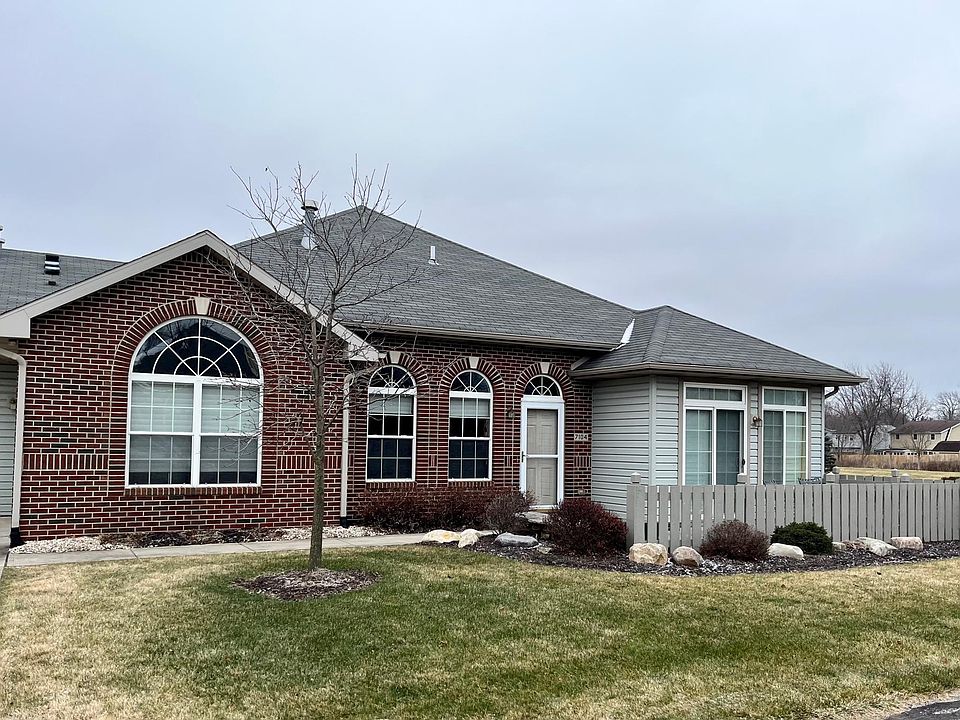 Front Exterior with fenced in patio area
