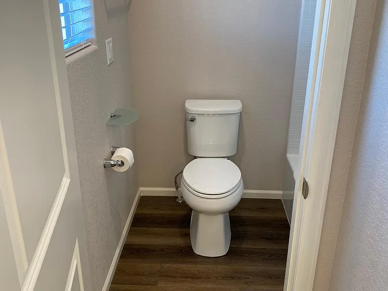 Upstairs bathroom, separate toilet/shower area