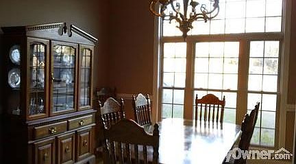 Dining Room 18 feet ceiling
						:
						Lg attractive DR with wood foors & arched window. Exquisite lighting fixtures.