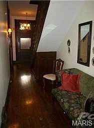 FOYER WITH ORIGINAL SCONCES