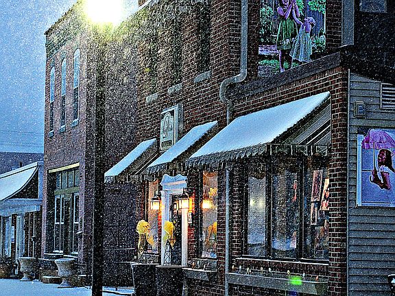 Snowy evening front facade