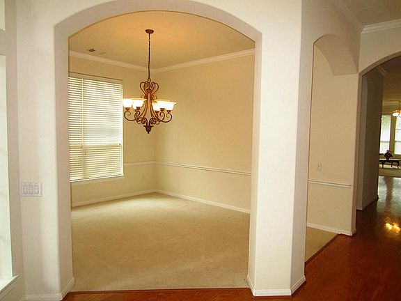Picture walls accentuate this dining room.