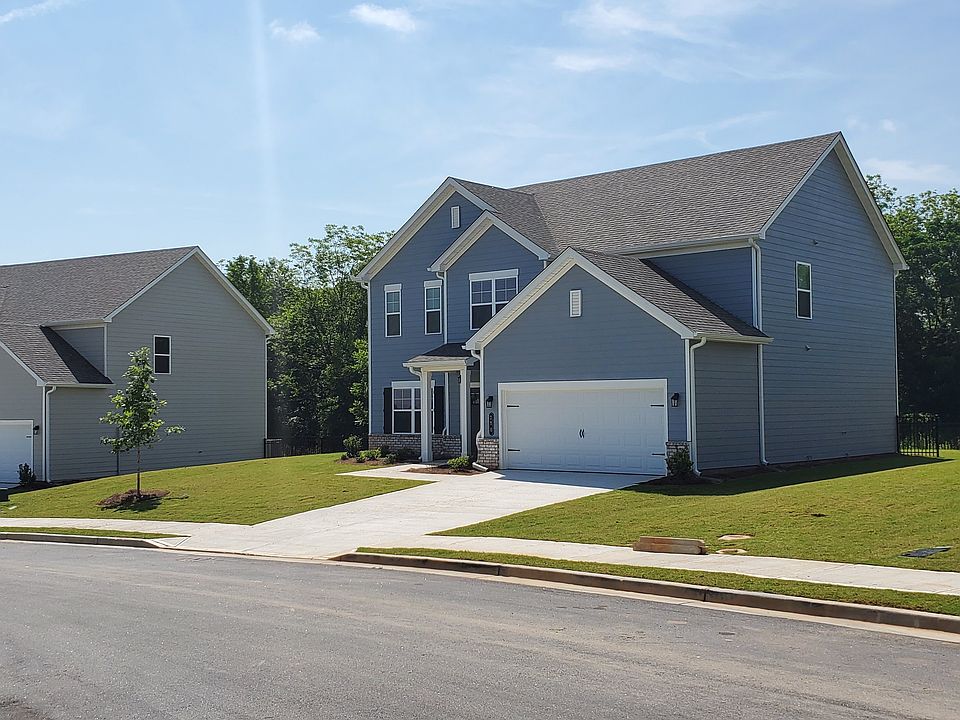 Southwind exterior: two-story homes with private driveways and attached garages.