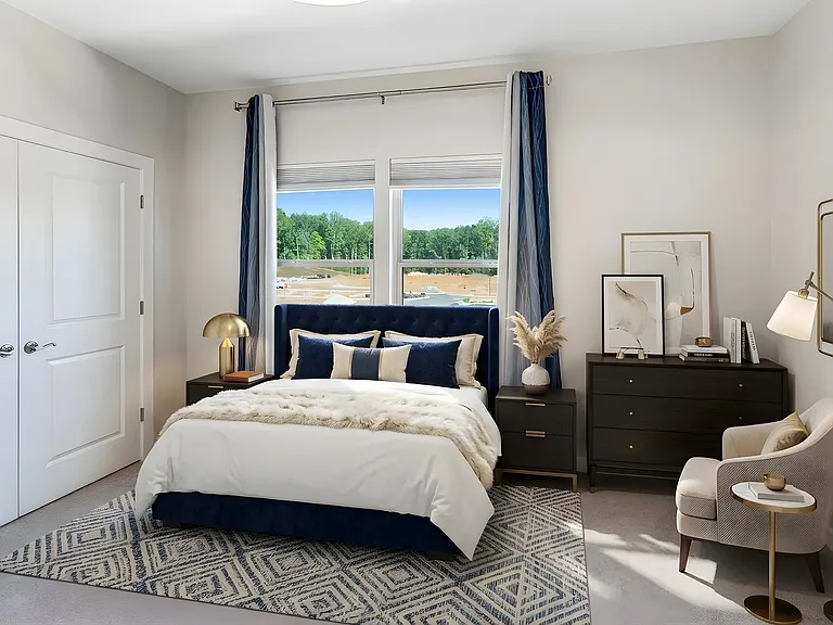 Bright and versatile secondary bedroom with generous closet space and plenty of natural light. Virtually staged.