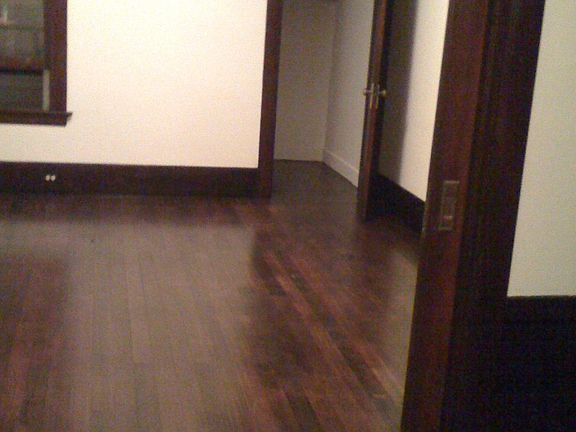 From living room to bedroom - parlor doors close off the room. Closet in the back of the bedroom.