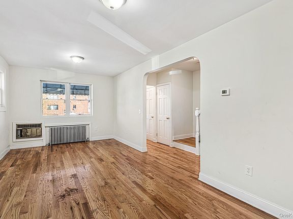 3rd image of 61-12 Main Street