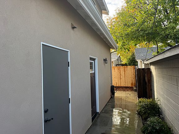 Door to garage and front door