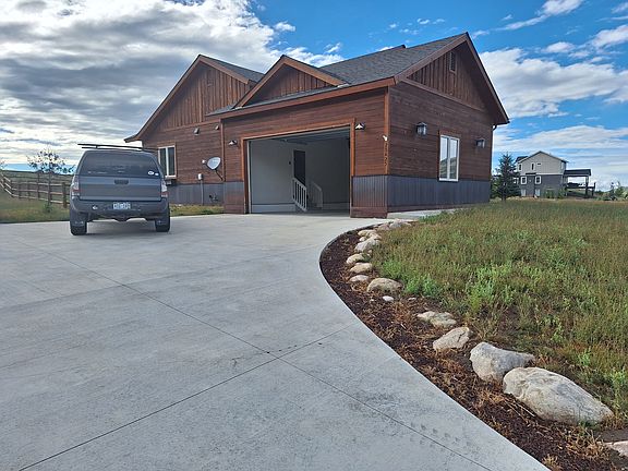 Garage and driveway. Large 2 car (22wx24 deep) heated garage with oversized (9 x 16) garage door.