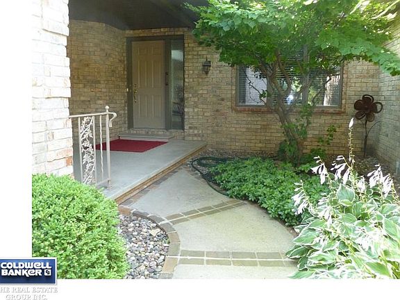 Curved walls, covered entrance