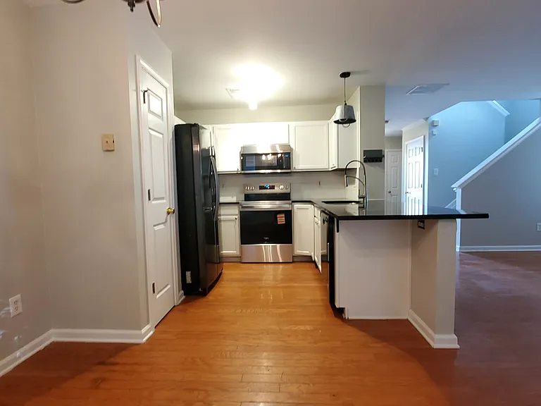 View of kitchen from rear patio door.