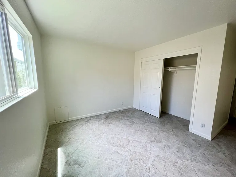 Lower level bedroom with closet and en-suite bath.