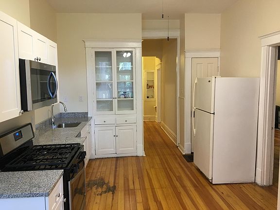 Kitchen with granite countertops and stainless steel appliances.