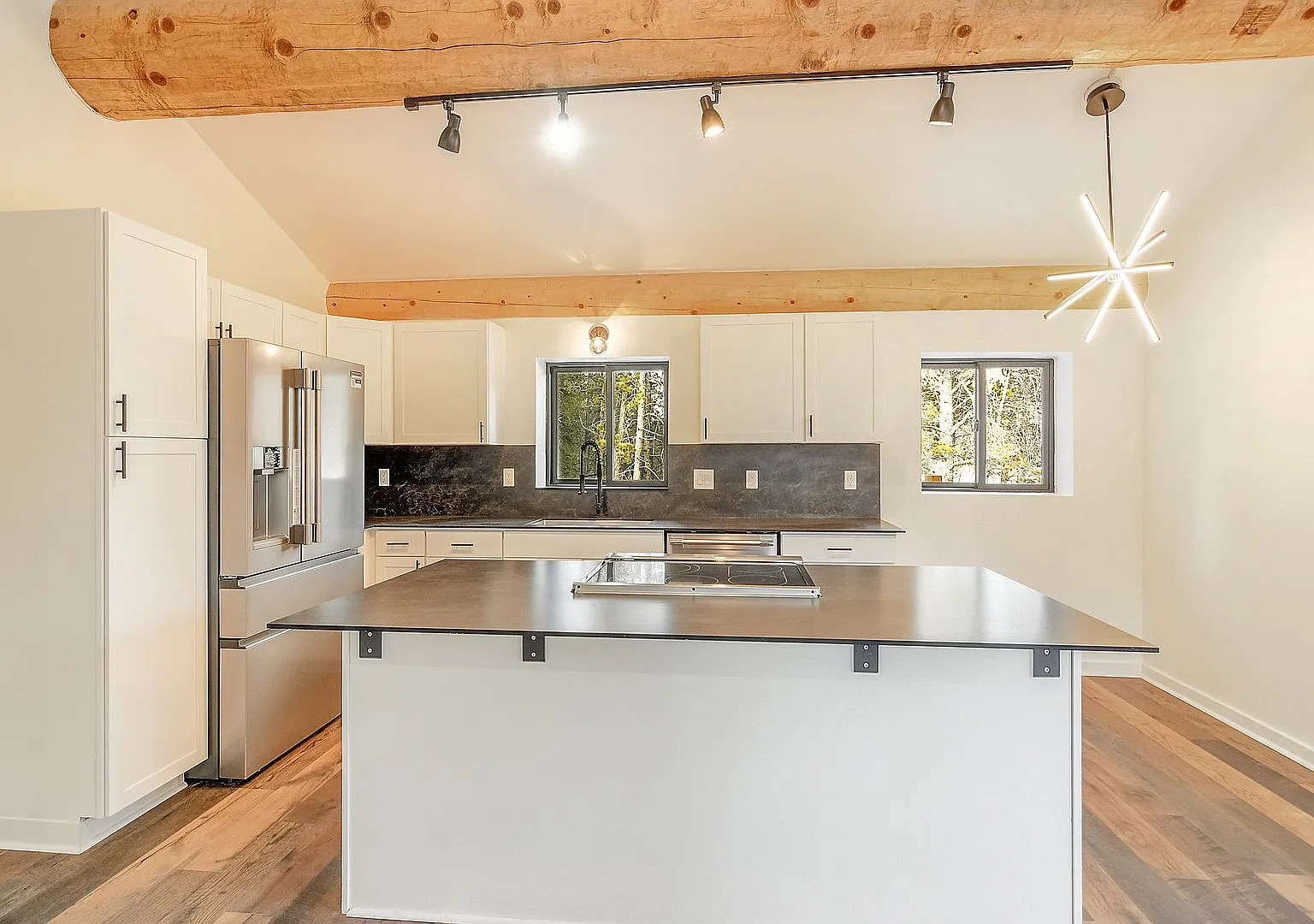New Construction! Great Views! Deck! 20 minutes from Breck! In-floor radiant heat! — Photo 2