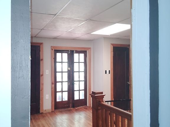 Staircase entry from main floor private access. Double doors lead to private deck.