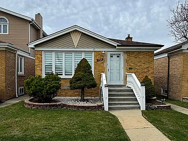 5428 S Linder Ave — exterior photo