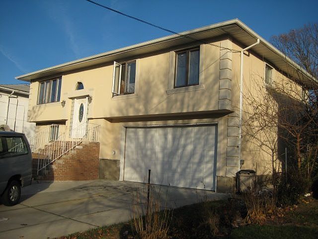 FRONT VIEW OF HOUSE