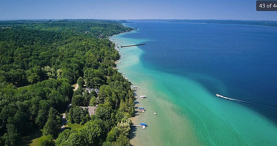 1st image of 7517 N West Torch Lake Dr
