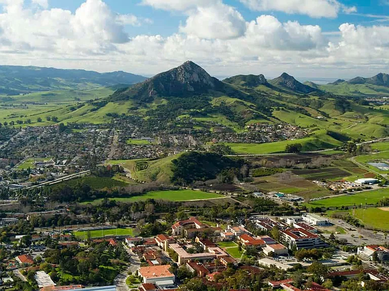 We are located on the north end of San Luis Obispo, near the center of this photograph, just off of Hwy 1. San Luis Obispo is a college town with many cultural activities. There are dozens of restaurants and shops within short walking distance.