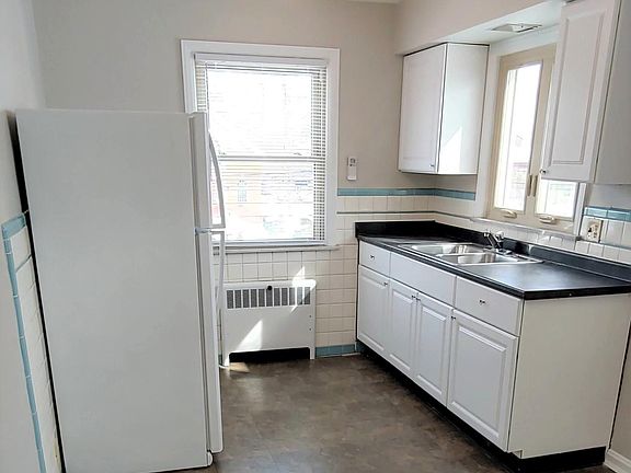 Alternate view of kitchen.