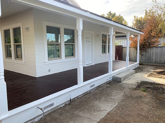 Front door. New windows, new paint, new roof, new exterior lighting!