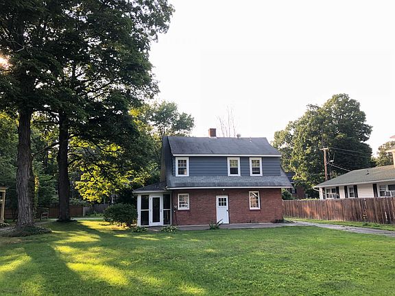 Full view of bacl yard and lawn