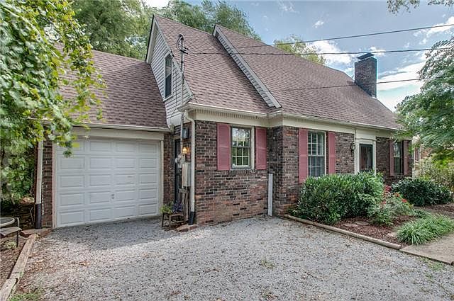 1938 curb appeal: street / driveway view