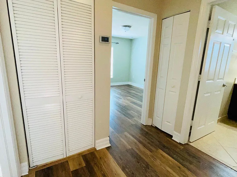 End of hallway to Bedroom, bathroom and laundry room