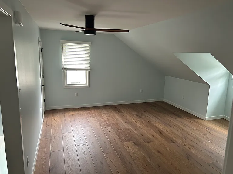 Living room with fan and light