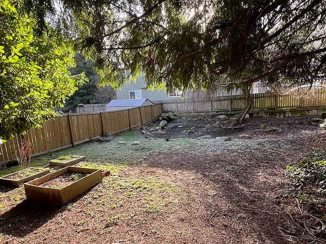 Huge backyard with gardening spaces