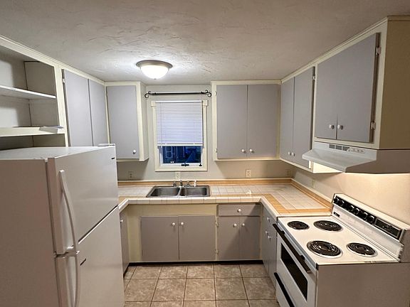 79 Conewago Dr - Kitchen with New 20 CuFt Refrigerator, Ceramic Tile Countertops, New Cabinet Paint & Shelf Liner